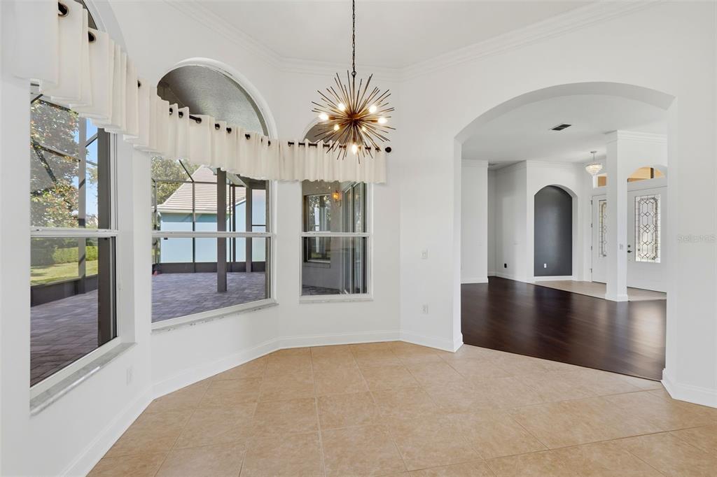 2822 Falcon Ridge Clermont, FL 34711 - Photo 24 of 59 a view of a living room with chandelier fan and couches