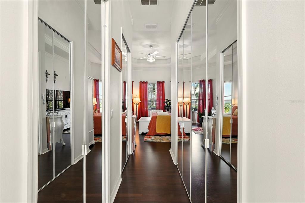 2822 Falcon Ridge Clermont, FL 34711 - Photo 27 of 59 a view of a hallway with living room and furniture