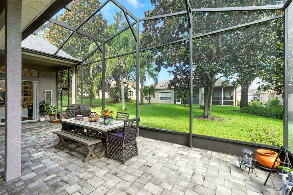 2822 Falcon Ridge Clermont, FL 34711 - Photo 39 of 59 a backyard of a house with outdoor seating