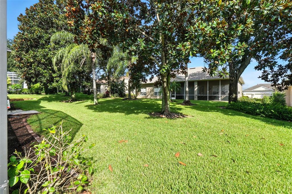 2822 Falcon Ridge Clermont, FL 34711 - Photo 42 of 59 a front view of a house with a yard