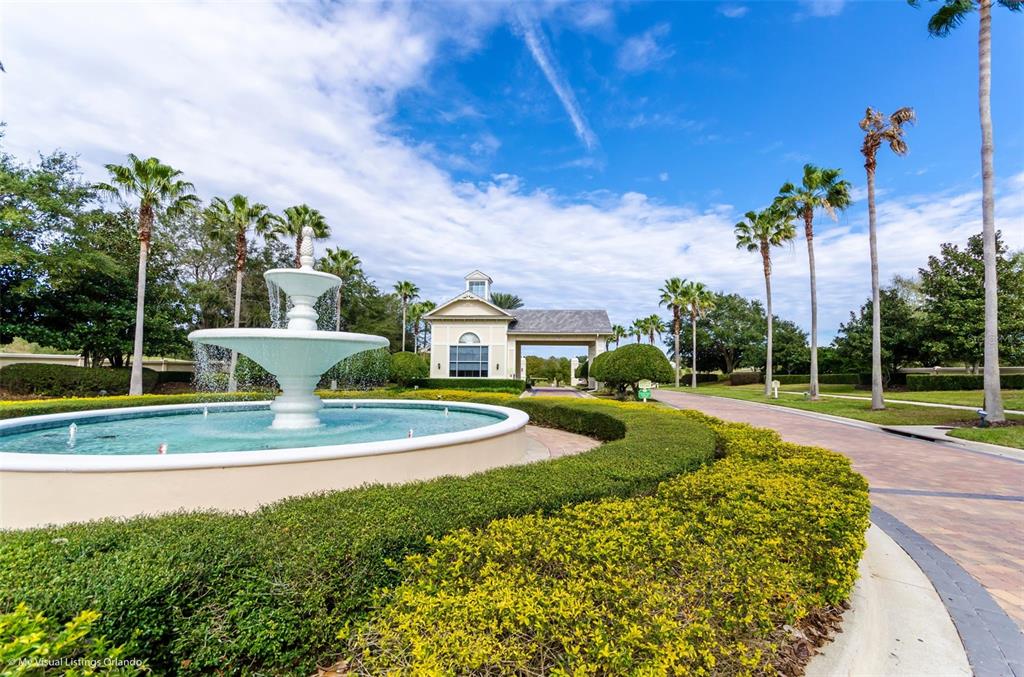 2822 Falcon Ridge Clermont, FL 34711 - Photo 46 of 59 a view of a fountain in front of a house