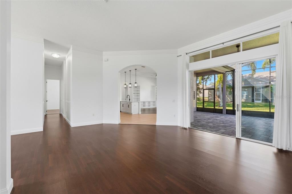 2822 Falcon Ridge Clermont, FL 34711 - Photo 8 of 59 a view of an empty room with glass door