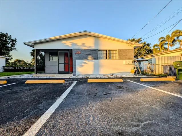 a view of a house with swimming pool