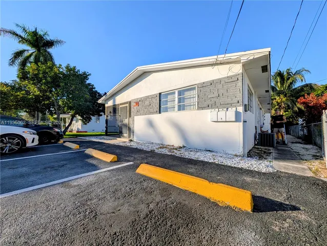 a view of a house with swimming pool