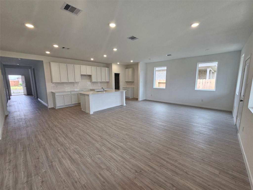 545 Shoreview Drive Conroe, TX 77303 - Photo 4 of 20 a view of kitchen with cabinets and wooden floor
