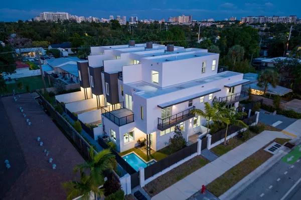 an aerial view of a house with a garden