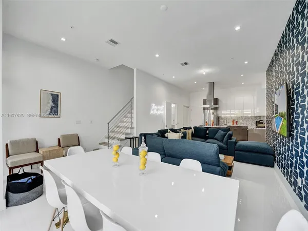 a living room with a couch and a table