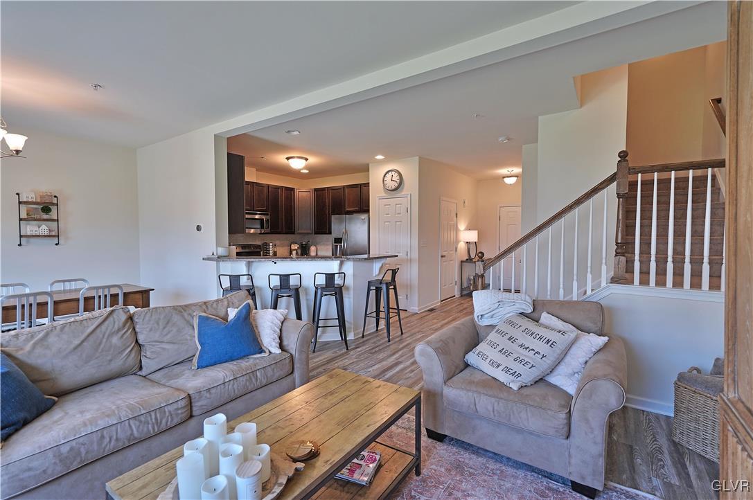 229 Snapdragon Way Allentown, PA 18104 - Photo 11 of 27 a living room with furniture and kitchen view