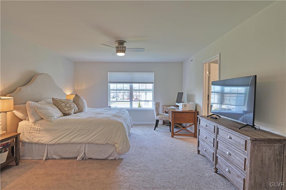 229 Snapdragon Way Allentown, PA 18104 - Photo 15 of 27 a spacious bedroom with a bed and furniture