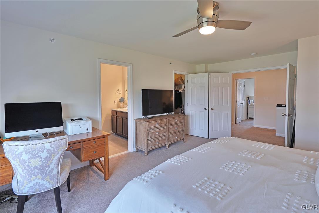 229 Snapdragon Way Allentown, PA 18104 - Photo 16 of 27 a bedroom with furniture and a flat screen tv