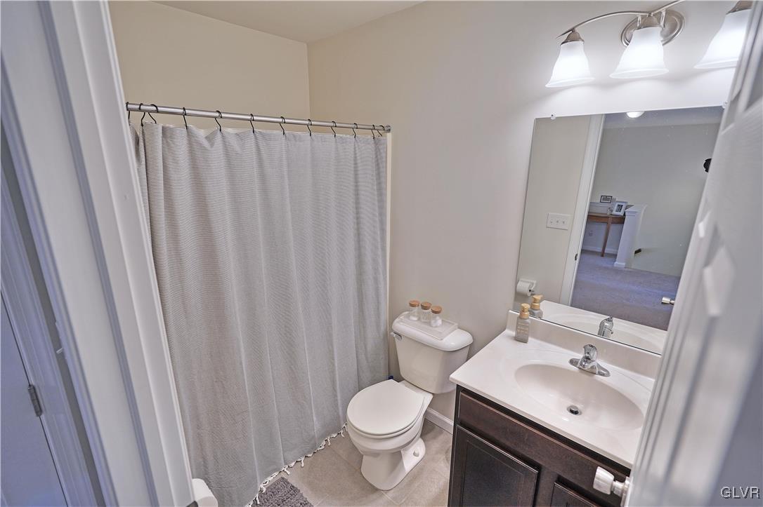 229 Snapdragon Way Allentown, PA 18104 - Photo 23 of 27 a bathroom with a sink and a toilet