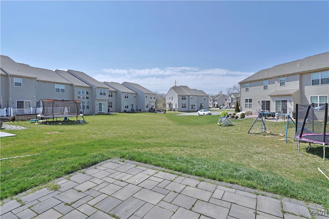 229 Snapdragon Way Allentown, PA 18104 - Photo 27 of 27 a view of a house with a backyard porch and sitting area