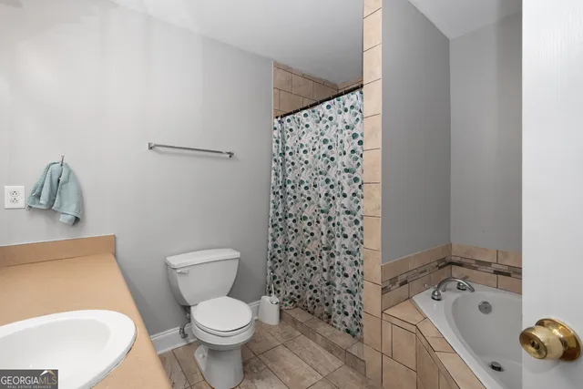 a bathroom with a sink and vanity