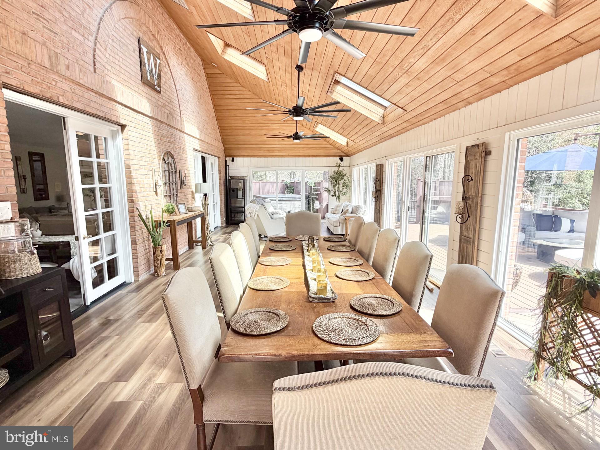 2 Teaberry Drive Medford, NJ 08055 - Photo 20 of 72 a dining room with furniture a chandelier and wooden floor
