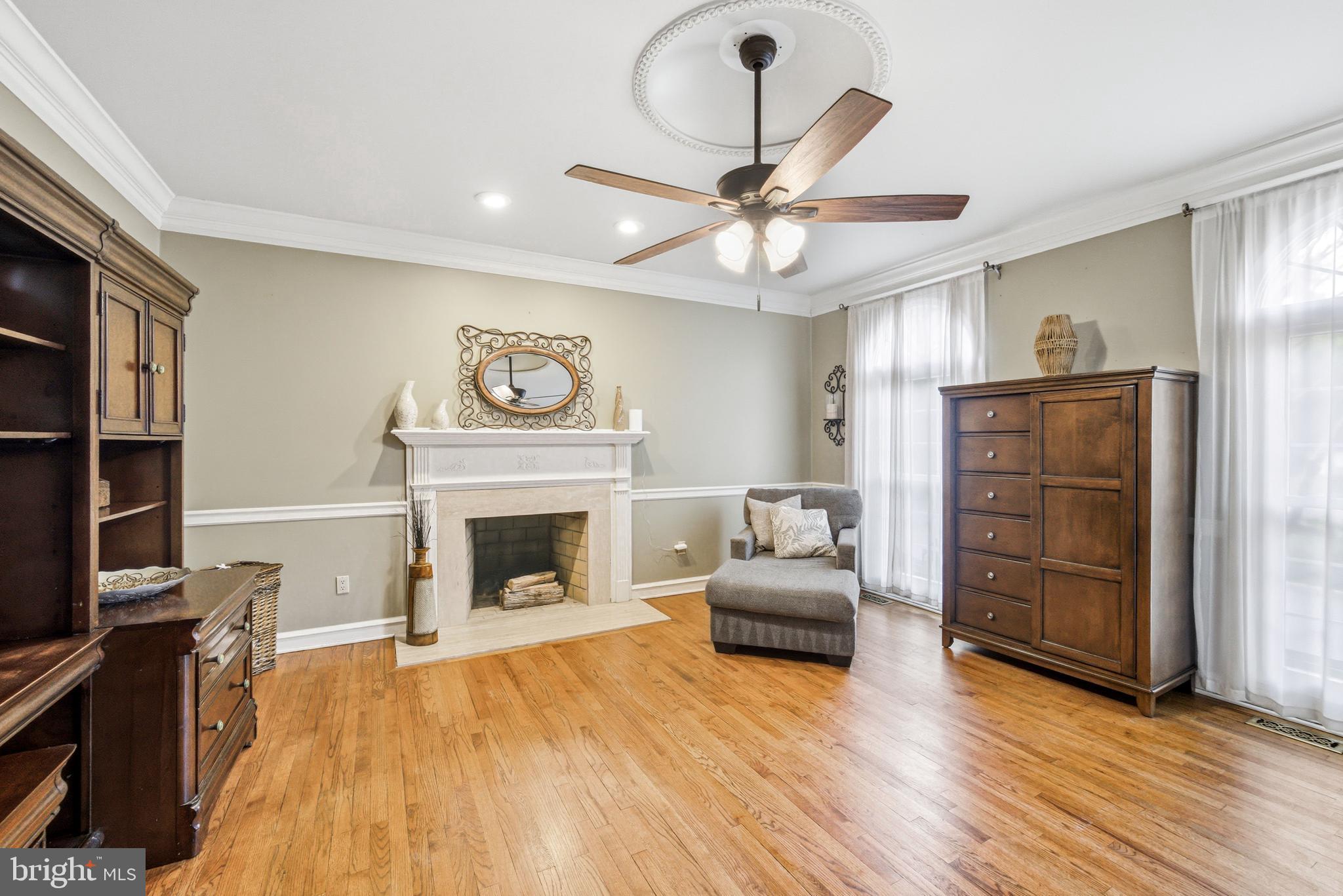 2 Teaberry Drive Medford, NJ 08055 - Photo 26 of 72 a living room with furniture and a fireplace