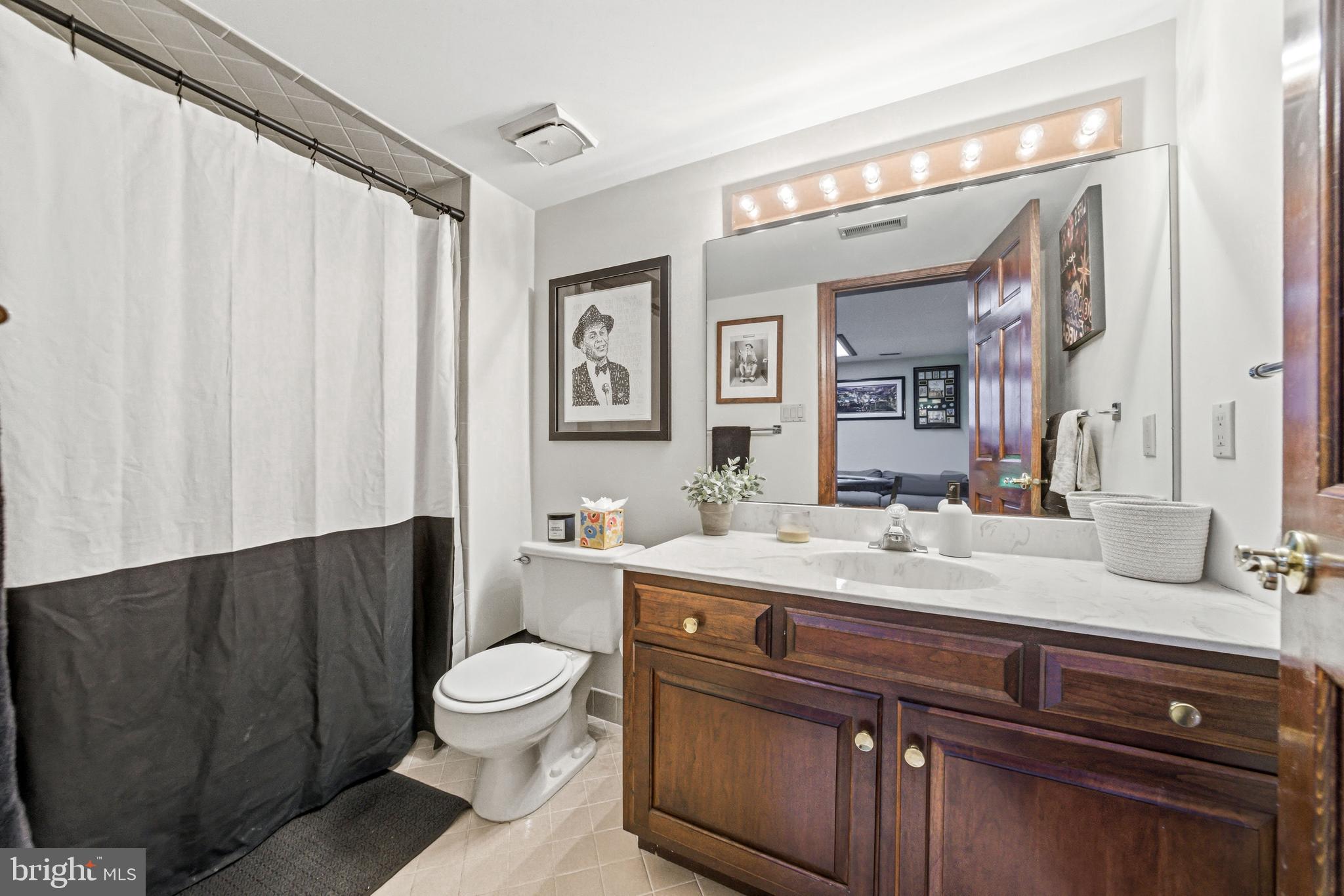 2 Teaberry Drive Medford, NJ 08055 - Photo 51 of 72 a bathroom with a granite countertop sink a toilet and a mirror
