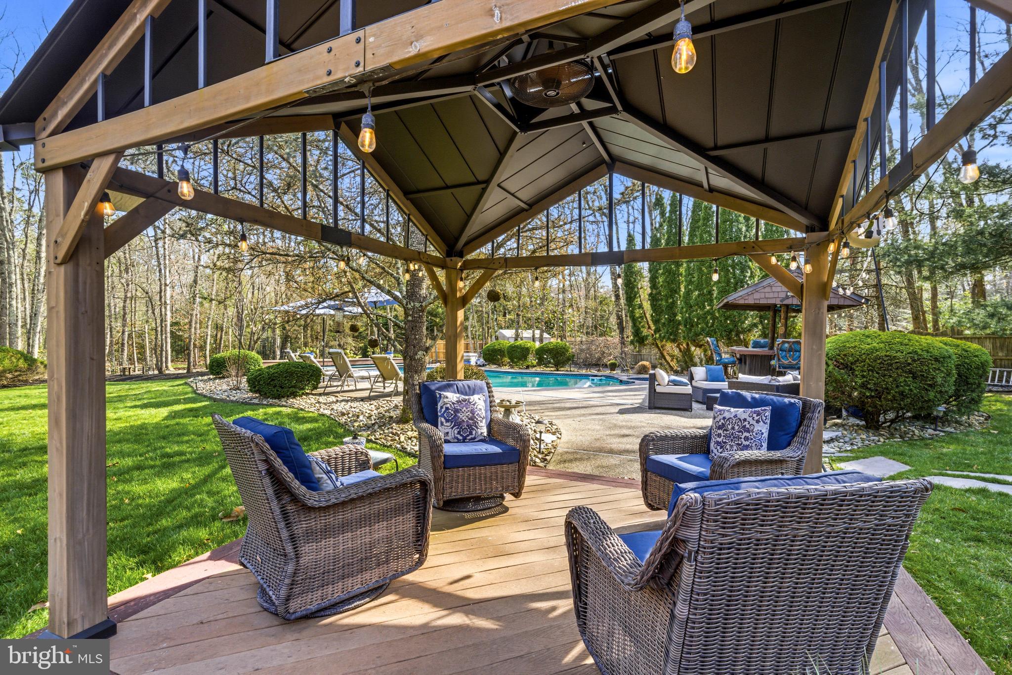 2 Teaberry Drive Medford, NJ 08055 - Photo 53 of 72 a view of a patio with couches table and chairs