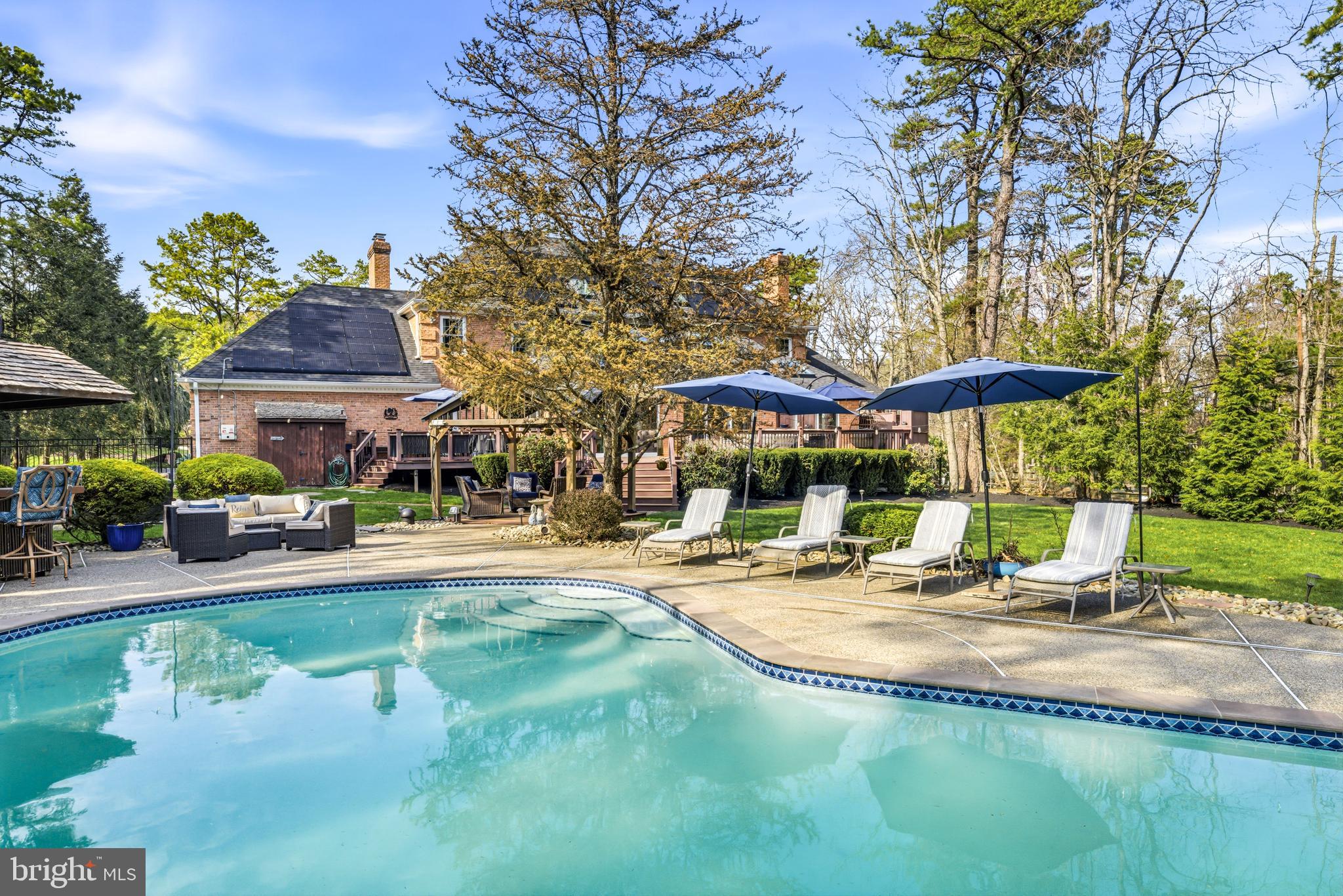 2 Teaberry Drive Medford, NJ 08055 - Photo 54 of 72 a view of a house with swimming pool and sitting area