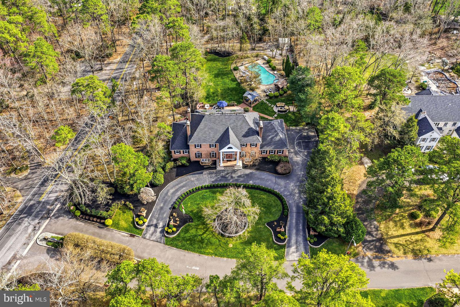 2 Teaberry Drive Medford, NJ 08055 - Photo 7 of 72 an aerial view of a house with a swimming pool patio and lake view