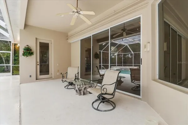 a open kitchen with a sink and wide window