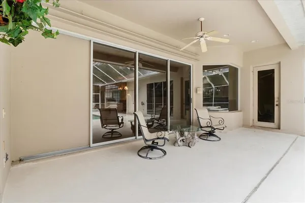 a view of a swimming pool with a porch