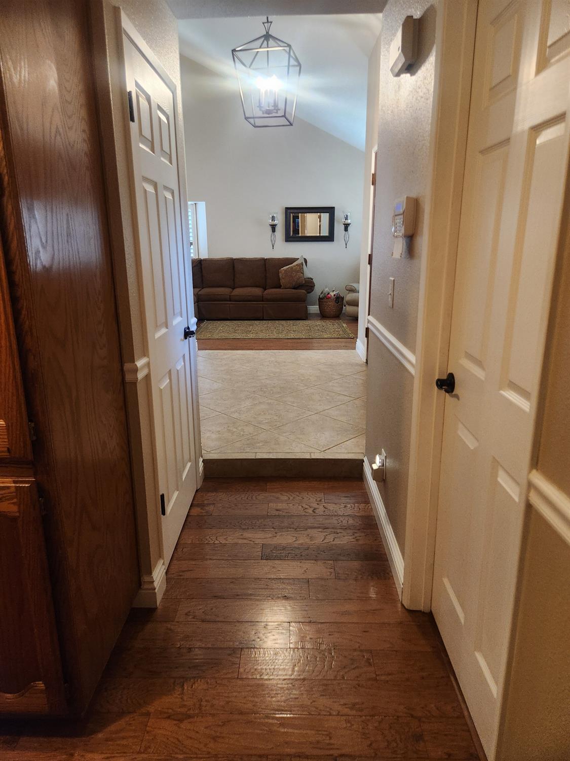 777 Jordanolo Drive Ripon, CA 95366 - Photo 28 of 61 a view of a hallway with wooden floor