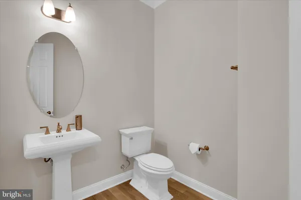 a bathroom with a bathtub a sink and a toilet