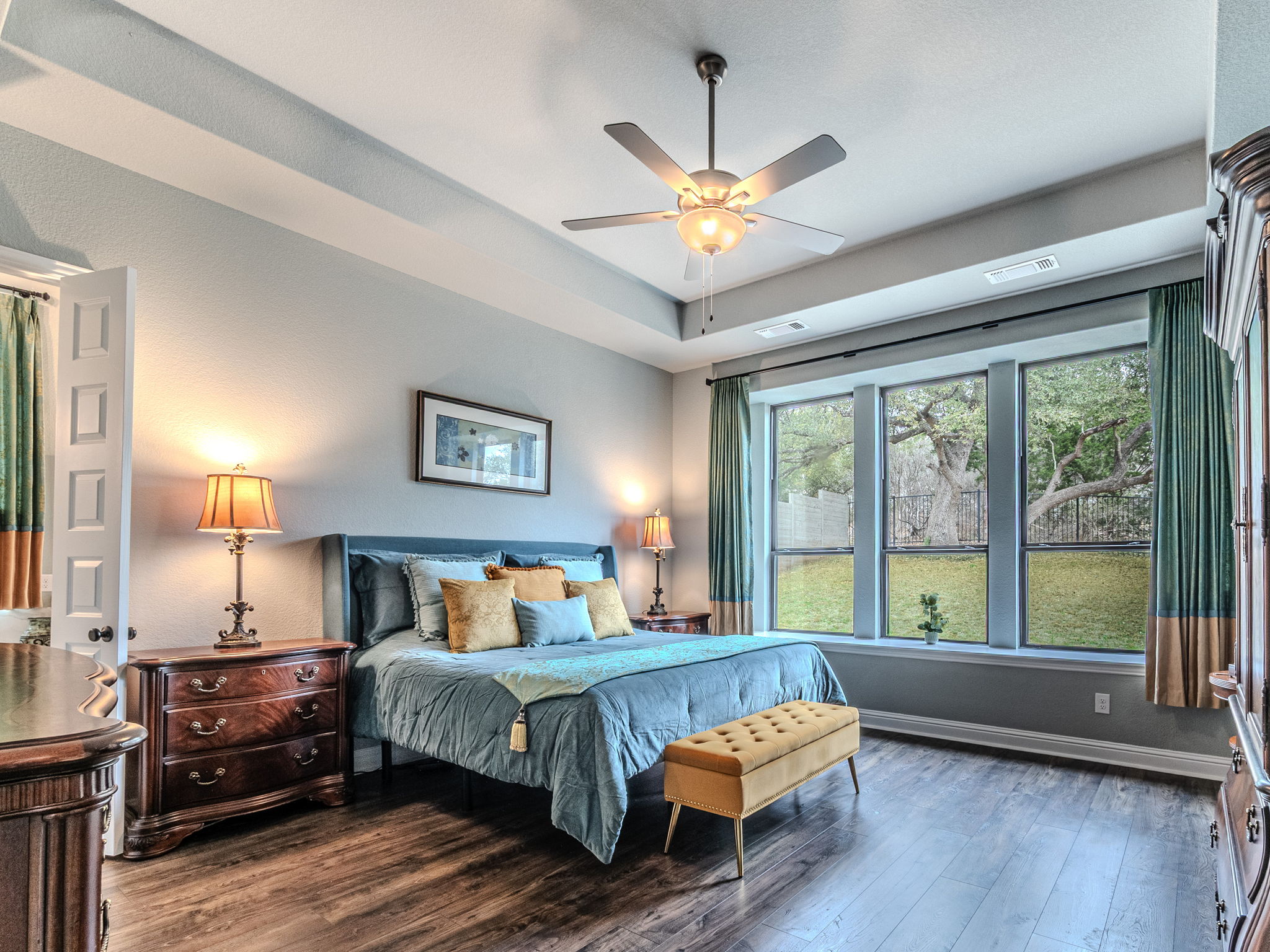 112 Hollytree Court Georgetown, TX 78628 - Photo 12 of 40 a bedroom with a bed and a large window