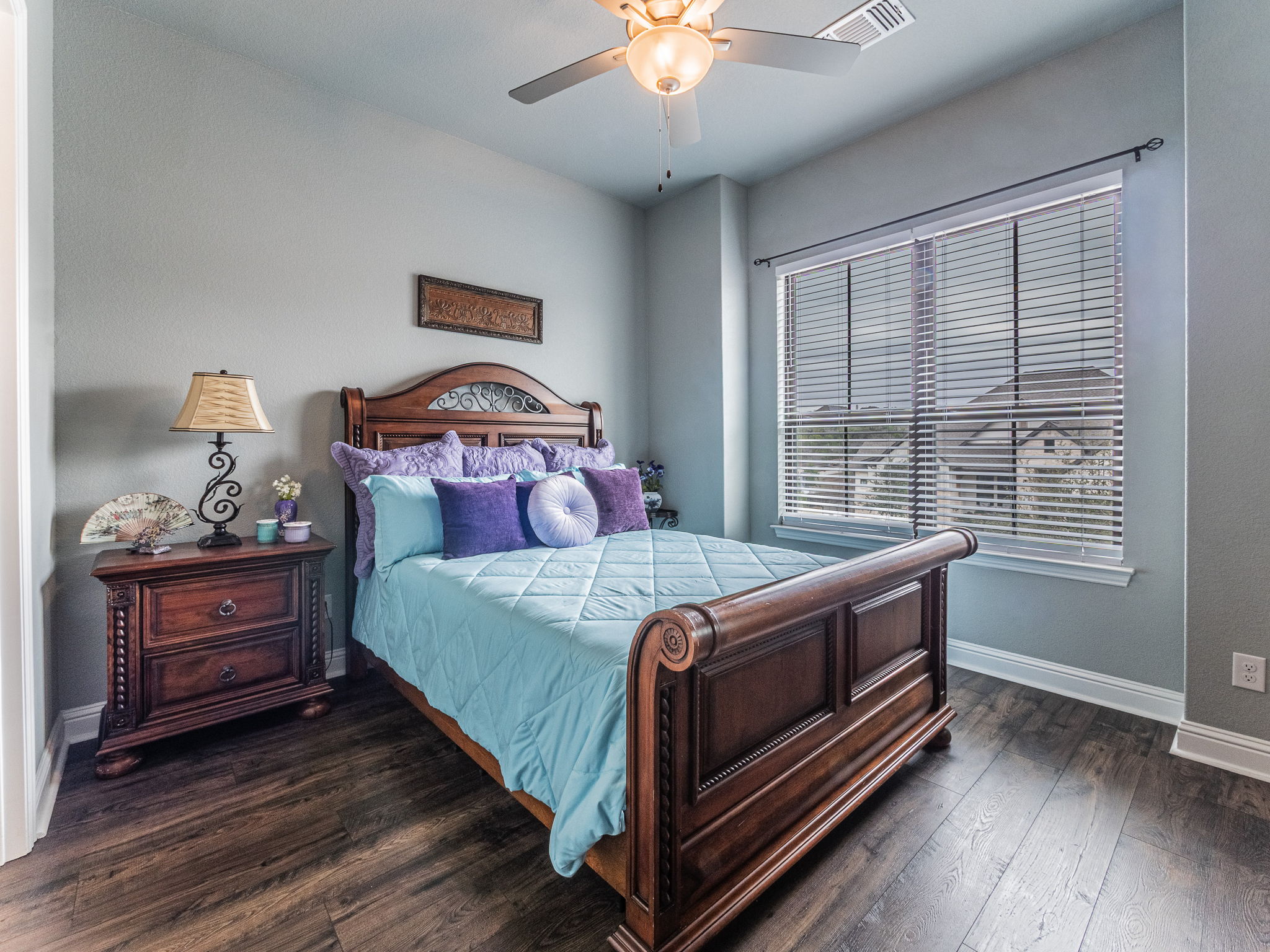 112 Hollytree Court Georgetown, TX 78628 - Photo 18 of 40 a bedroom with a bed and a window