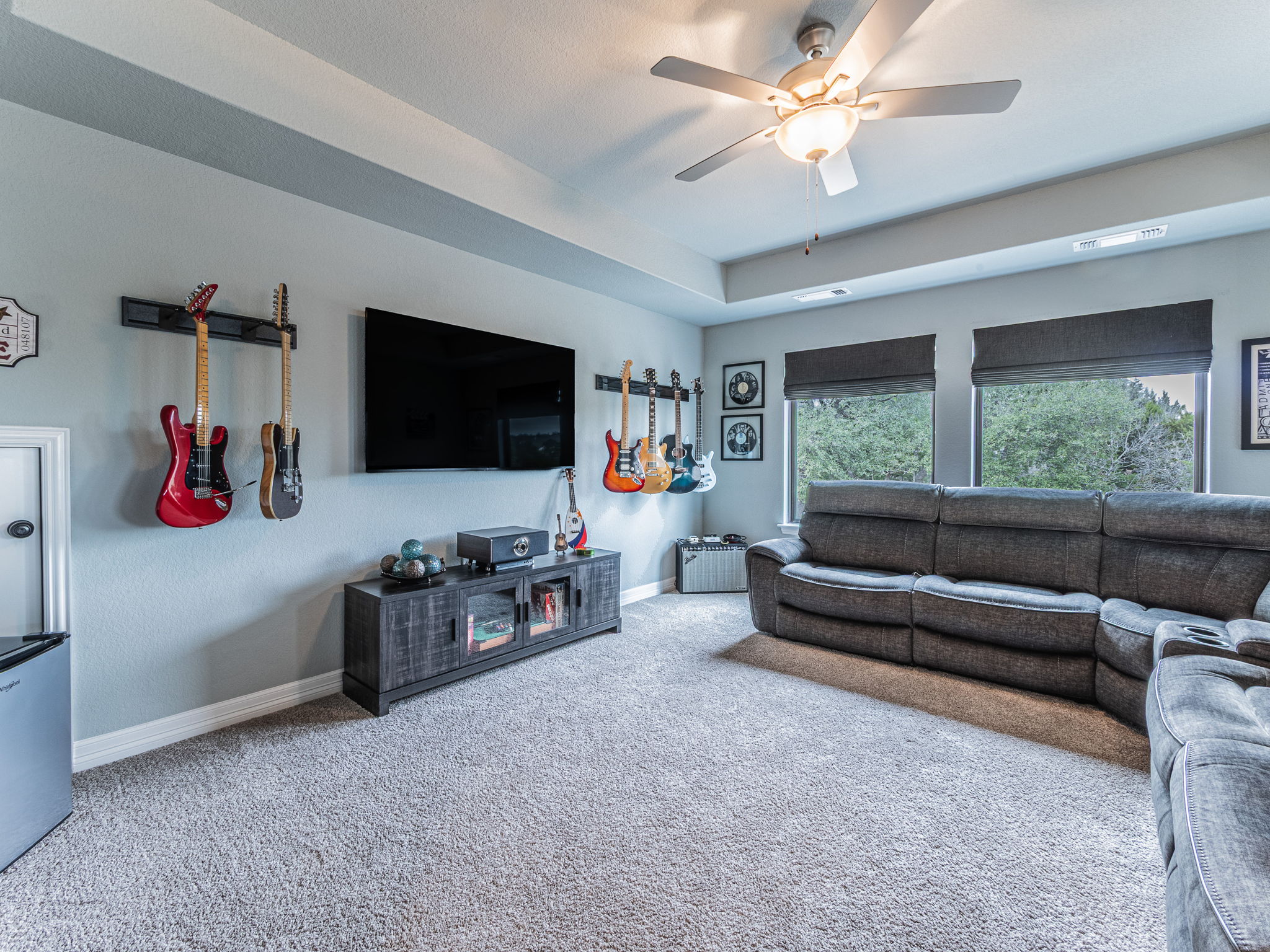 112 Hollytree Court Georgetown, TX 78628 - Photo 21 of 40 a living room with furniture and a flat screen tv