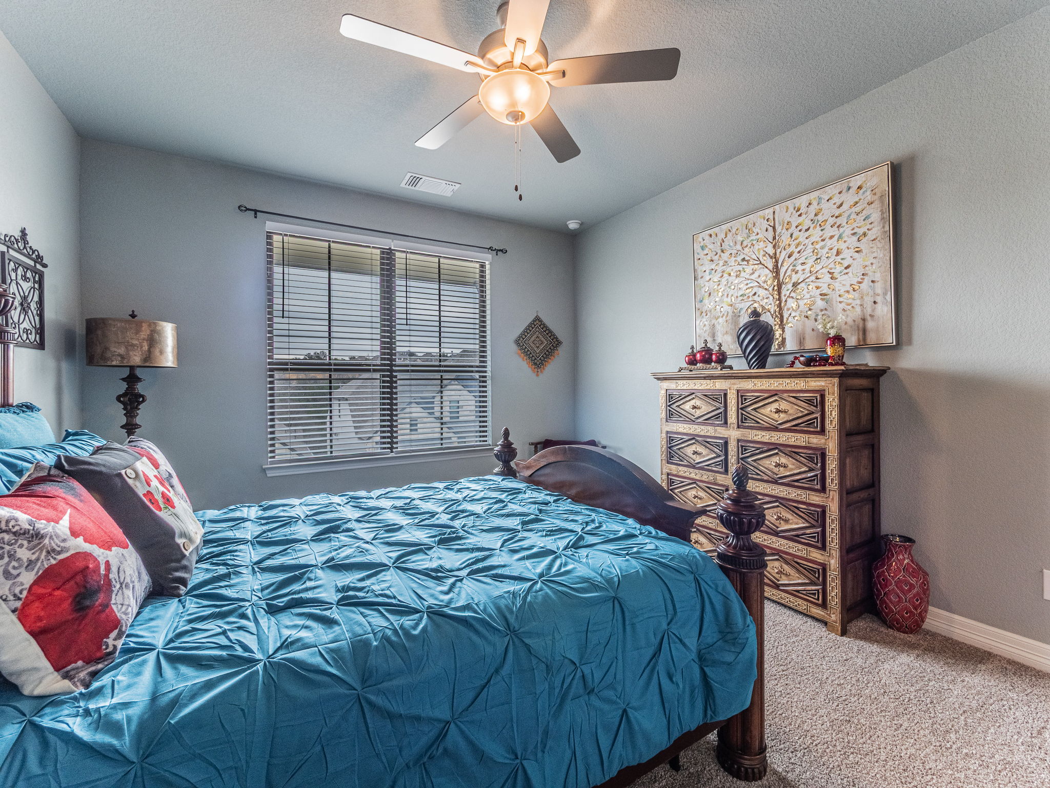 112 Hollytree Court Georgetown, TX 78628 - Photo 25 of 40 a bedroom with a bed and a window
