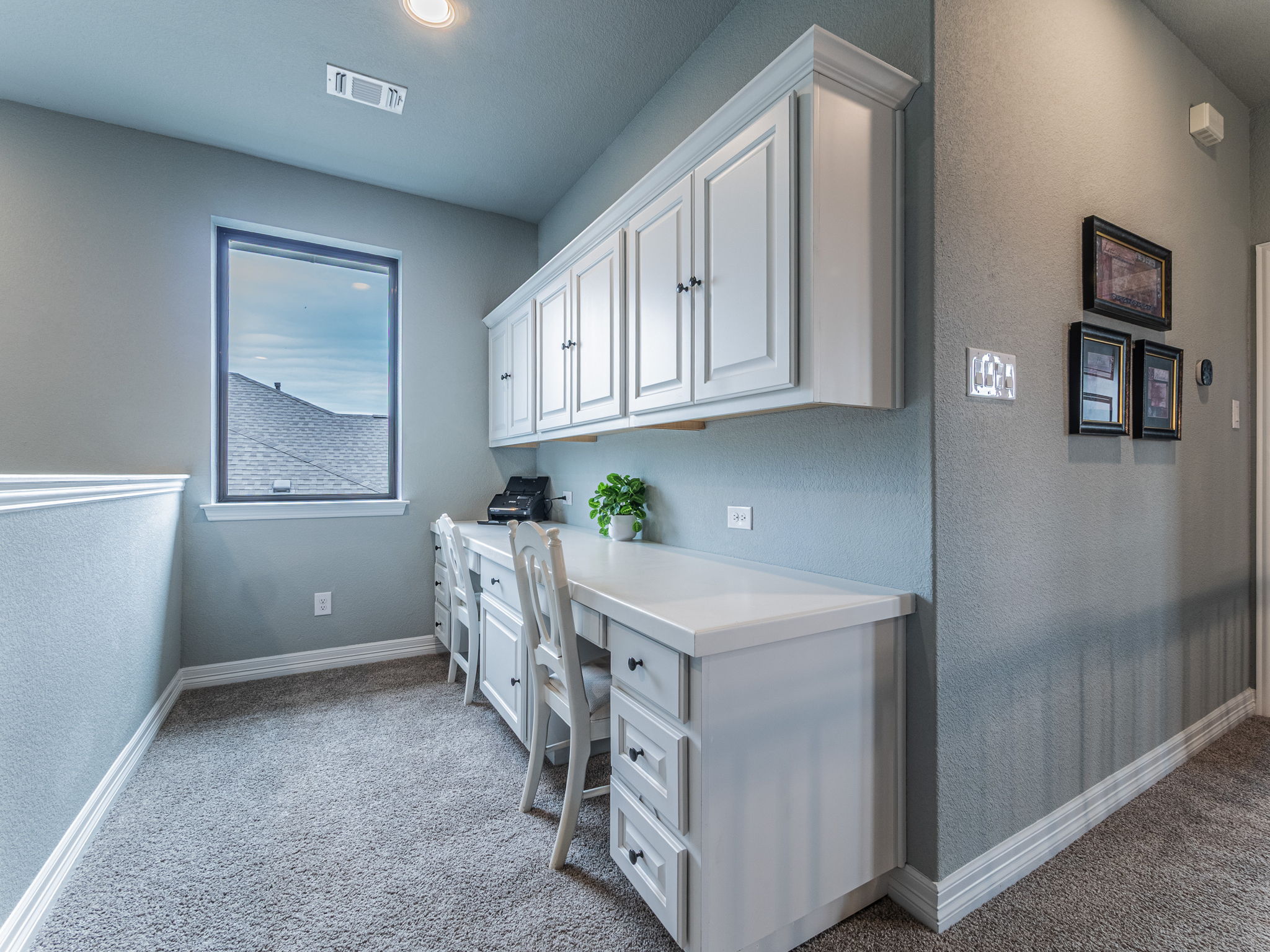 112 Hollytree Court Georgetown, TX 78628 - Photo 29 of 40 a view of cabinets with window
