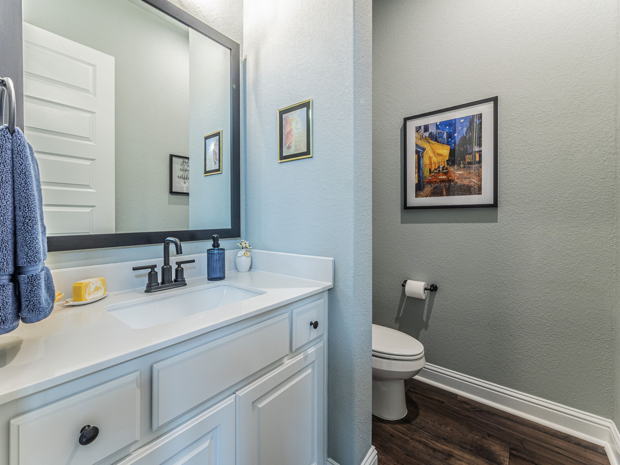 112 Hollytree Court Georgetown, TX 78628 - Photo 30 of 40 a bathroom with a toilet sink and mirror