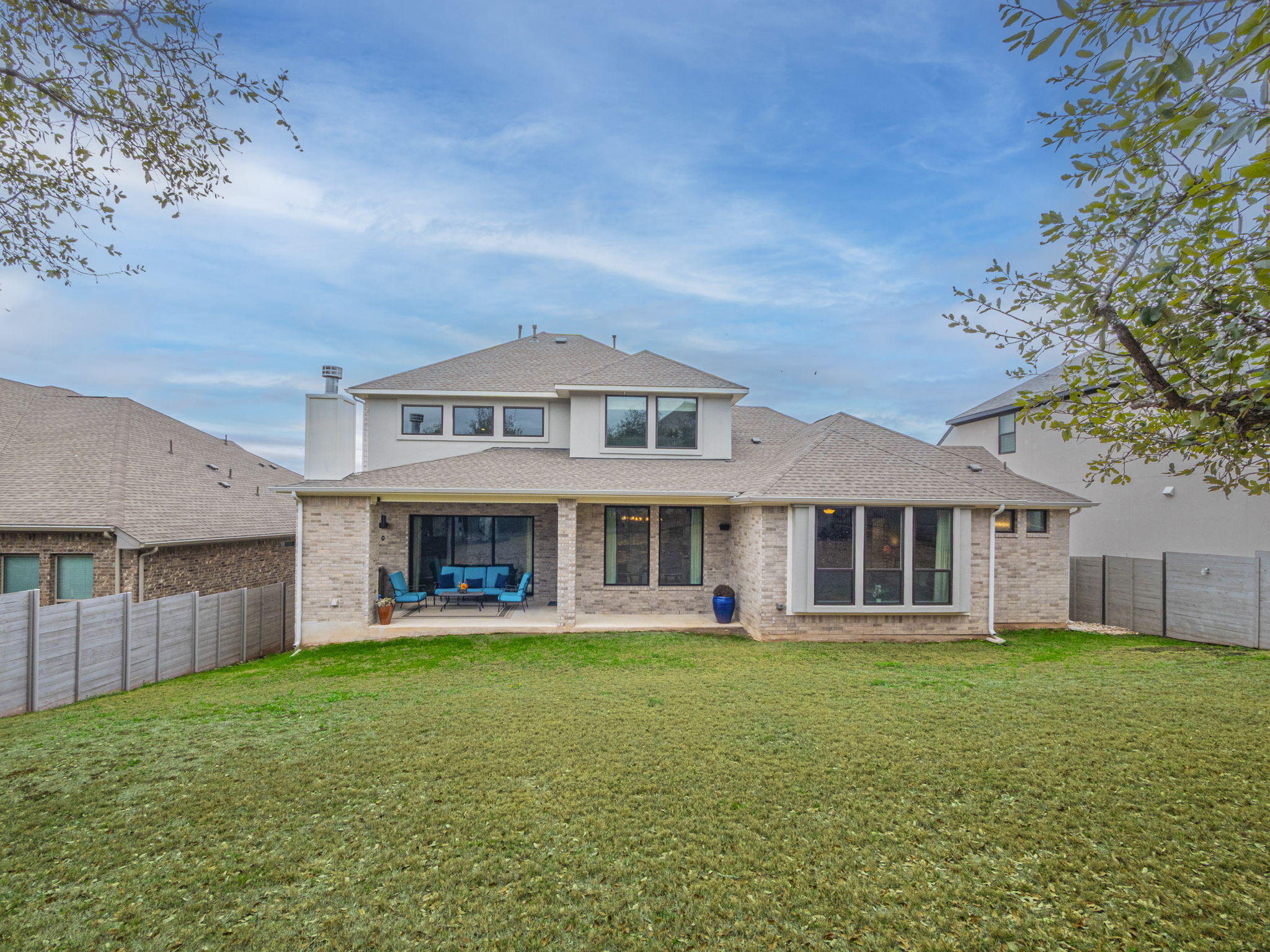 112 Hollytree Court Georgetown, TX 78628 - Photo 33 of 40 a view of a house with a yard and sitting area