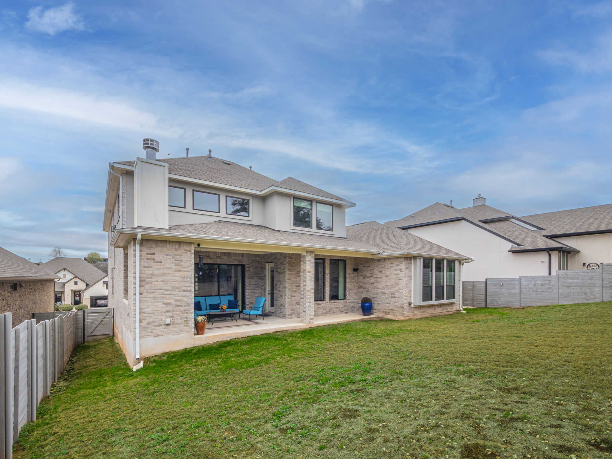 112 Hollytree Court Georgetown, TX 78628 - Photo 34 of 40 a view of a big house with a big yard and large trees