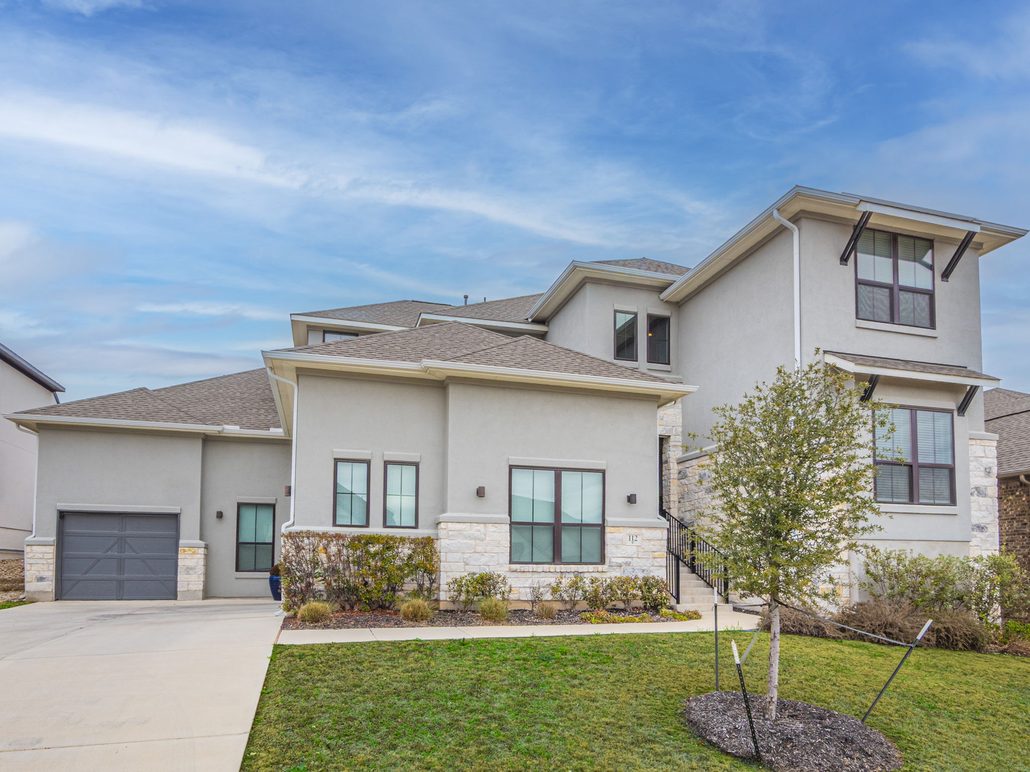 112 Hollytree Court Georgetown, TX 78628 - Photo 4 of 40 a front view of a house with a yard