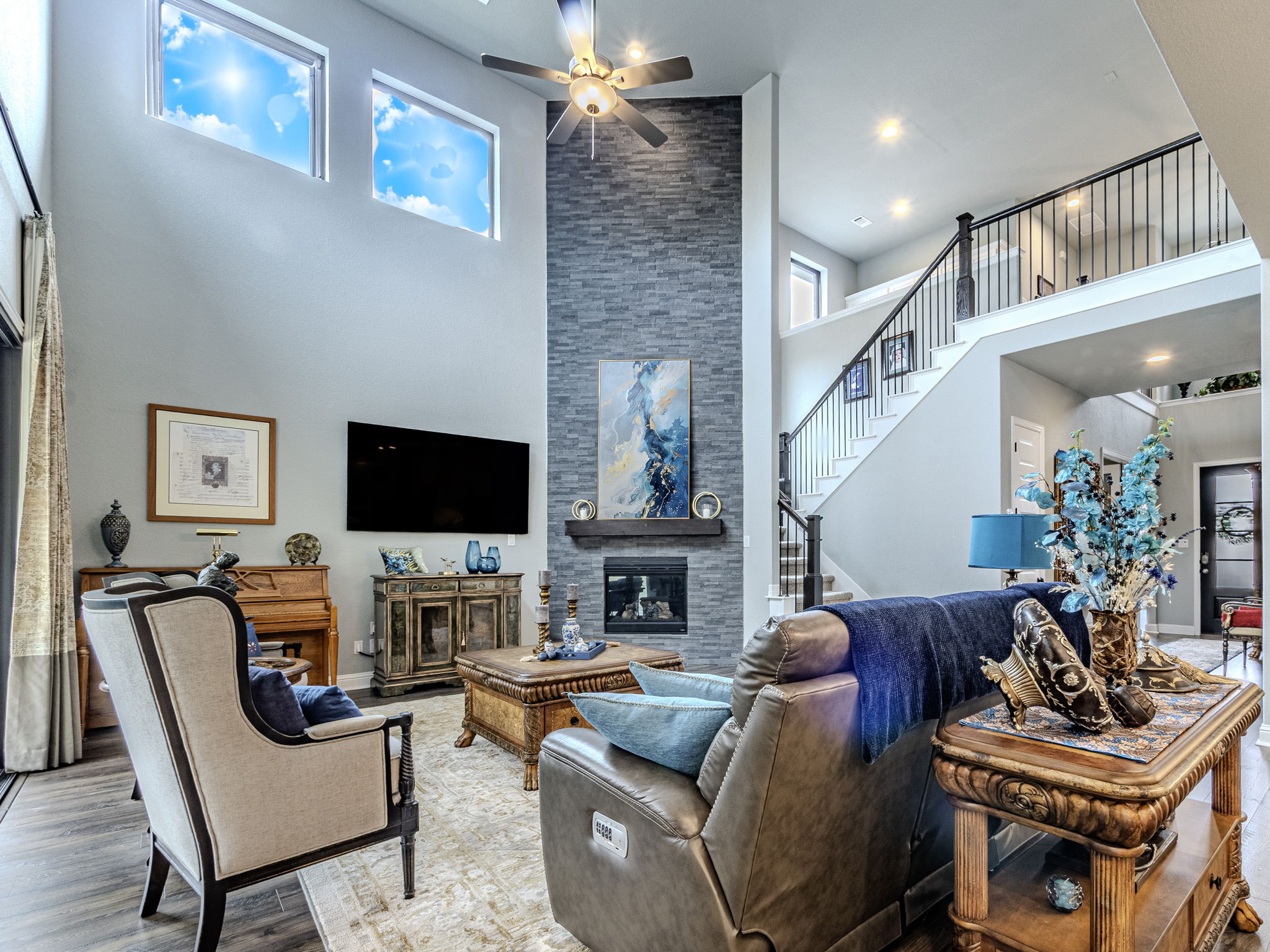 112 Hollytree Court Georgetown, TX 78628 - Photo 7 of 40 a living room with furniture a fireplace and a flat screen tv