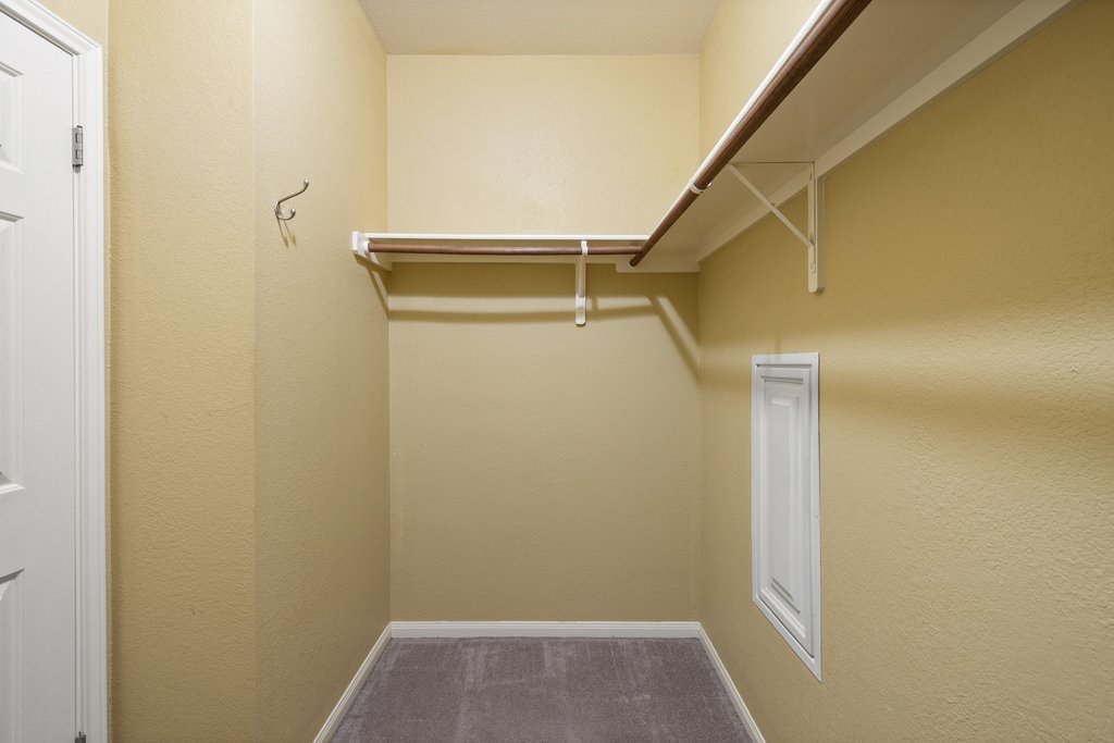 347 Spring Drive Kyle, TX 78640 - Photo 33 of 40 Ample hanging and storage space provided by thoughtfully designed closet shelving.
