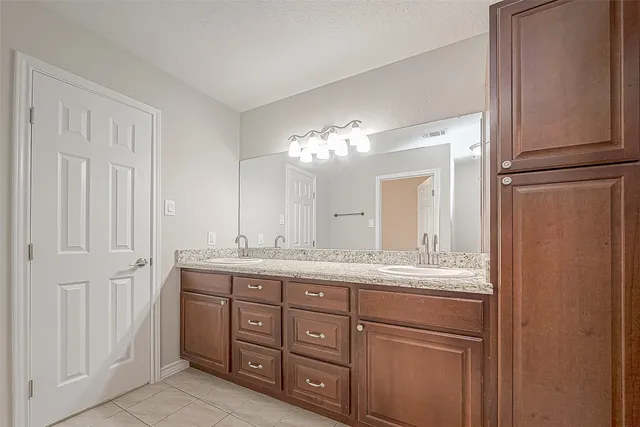 a view of a chandelier fan in a room