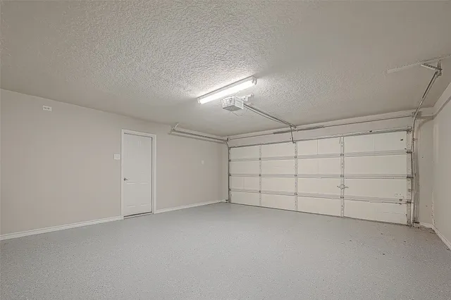 a bathroom with a sink a toilet a mirror and shower