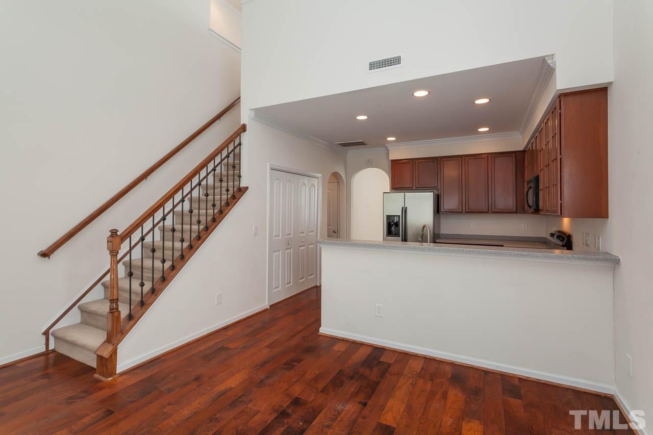 4708 Altha Street Raleigh, NC 27606 - Photo 13 of 25 a view of kitchen with wooden floor and electronic appliances