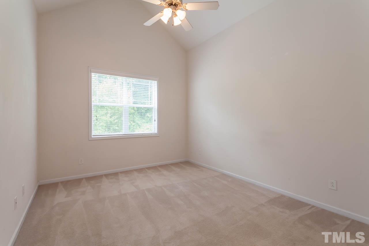 4708 Altha Street Raleigh, NC 27606 - Photo 14 of 25 an empty room with a window