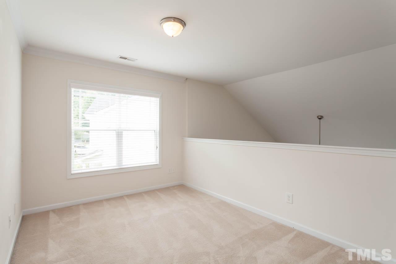4708 Altha Street Raleigh, NC 27606 - Photo 16 of 25 an empty room with a window