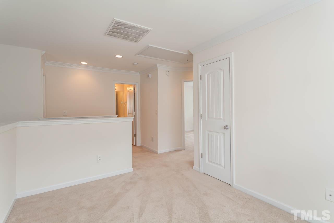 4708 Altha Street Raleigh, NC 27606 - Photo 17 of 25 a view of a hallway