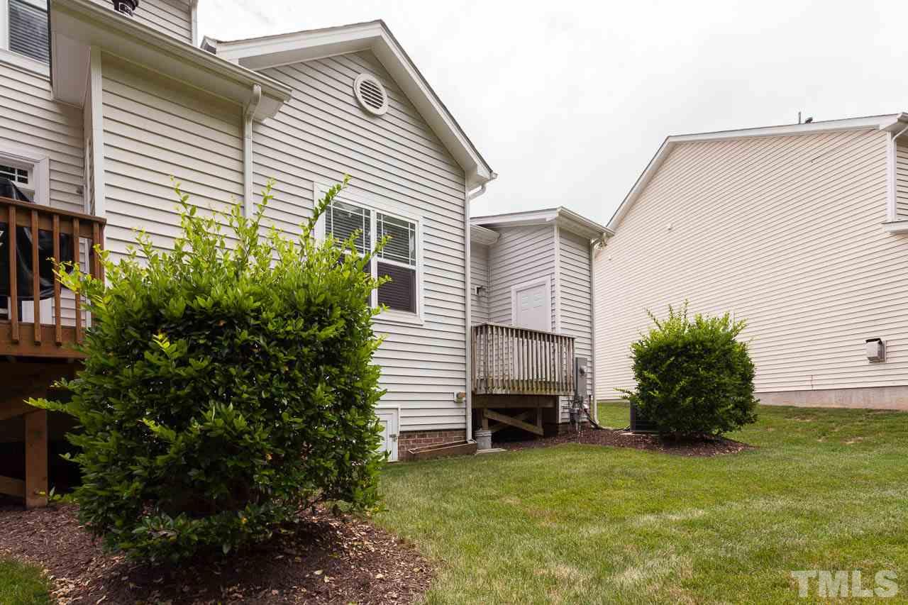 4708 Altha Street Raleigh, NC 27606 - Photo 20 of 25 a view of a house with backyard