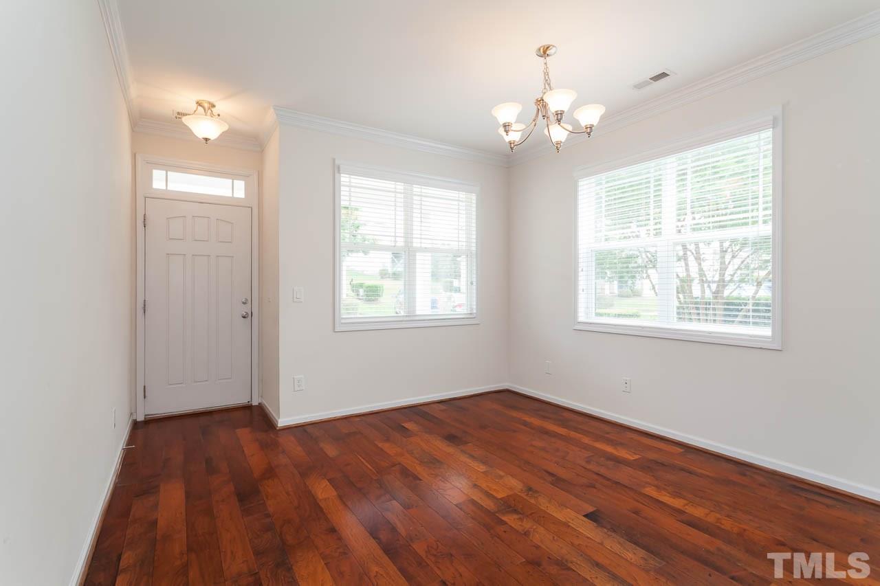 4708 Altha Street Raleigh, NC 27606 - Photo 4 of 25 a view of livingroom with window
