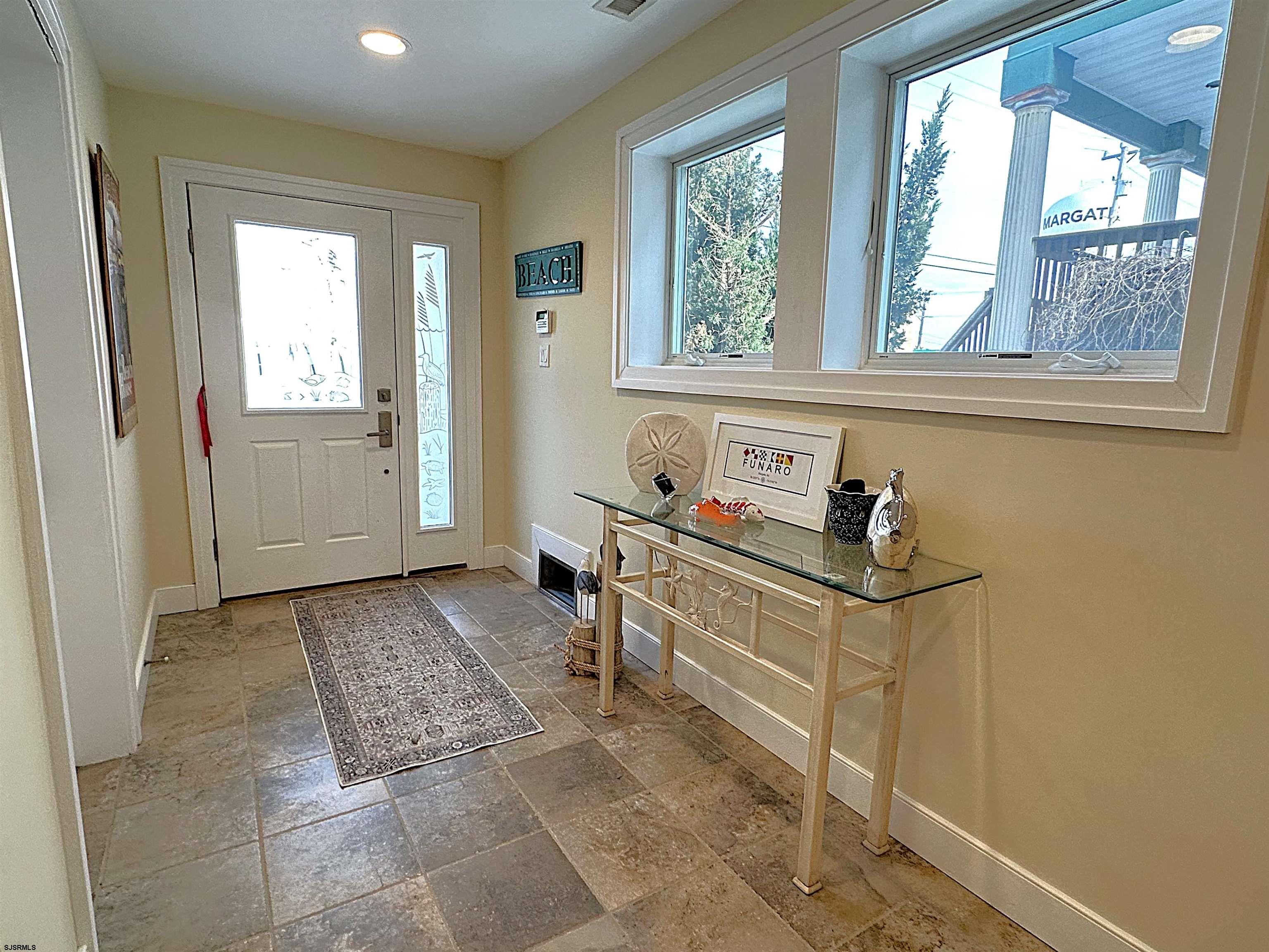214 North Decatur Avenue, Unit B Margate City, NJ 08402 - Photo 12 of 23 a view of a room that has a window in it