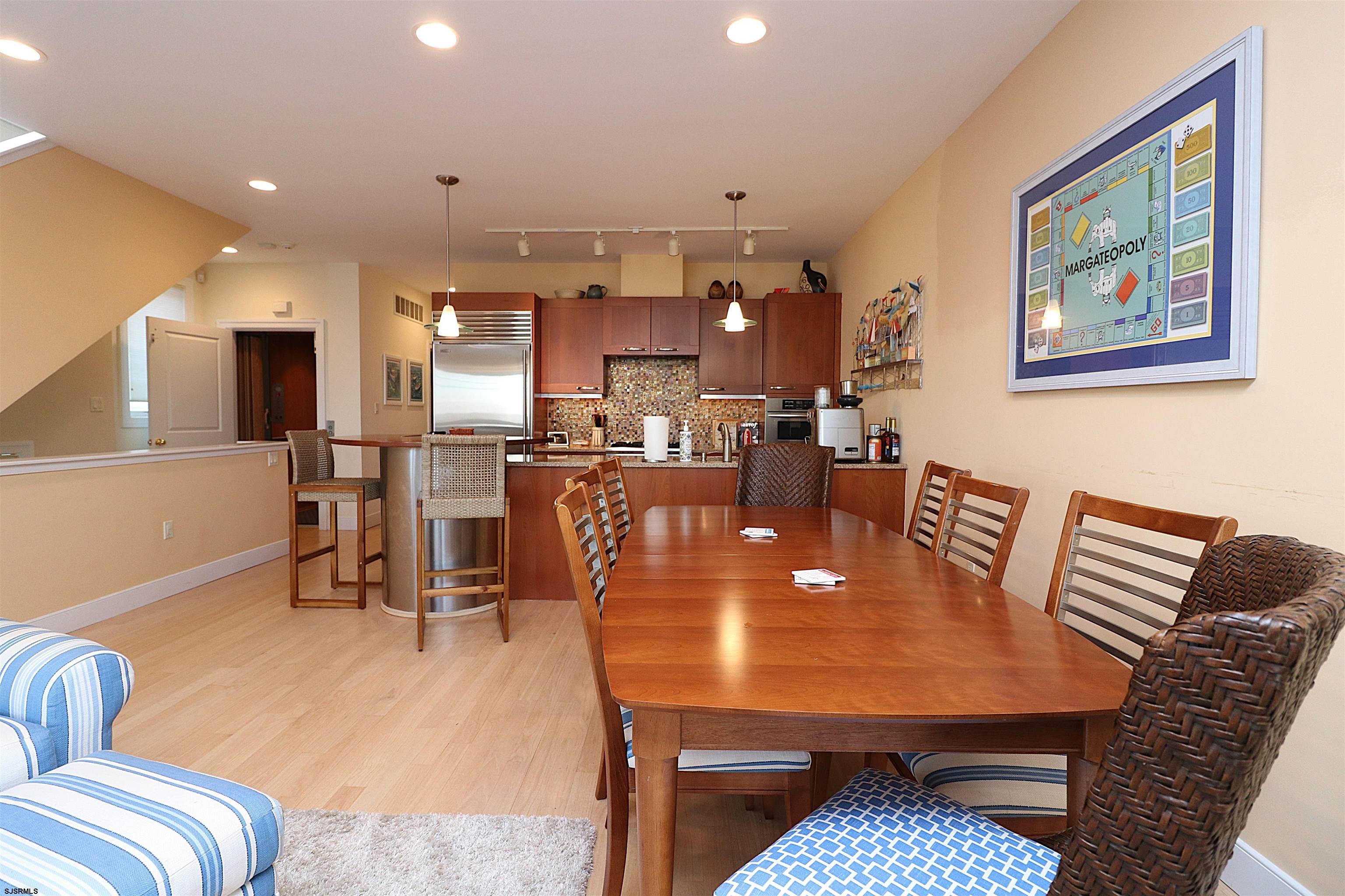 214 North Decatur Avenue, Unit B Margate City, NJ 08402 - Photo 19 of 23 a dining room with furniture and wooden floor