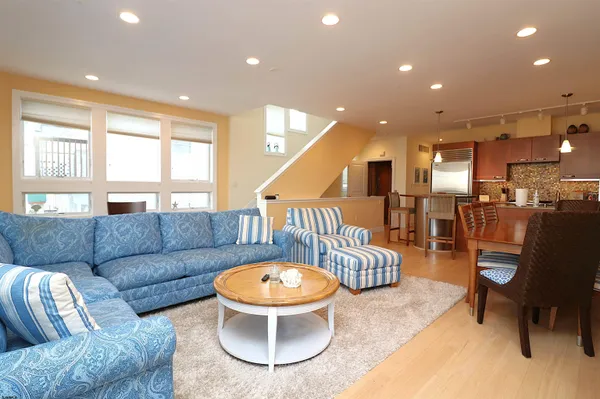 a living room with furniture and a table