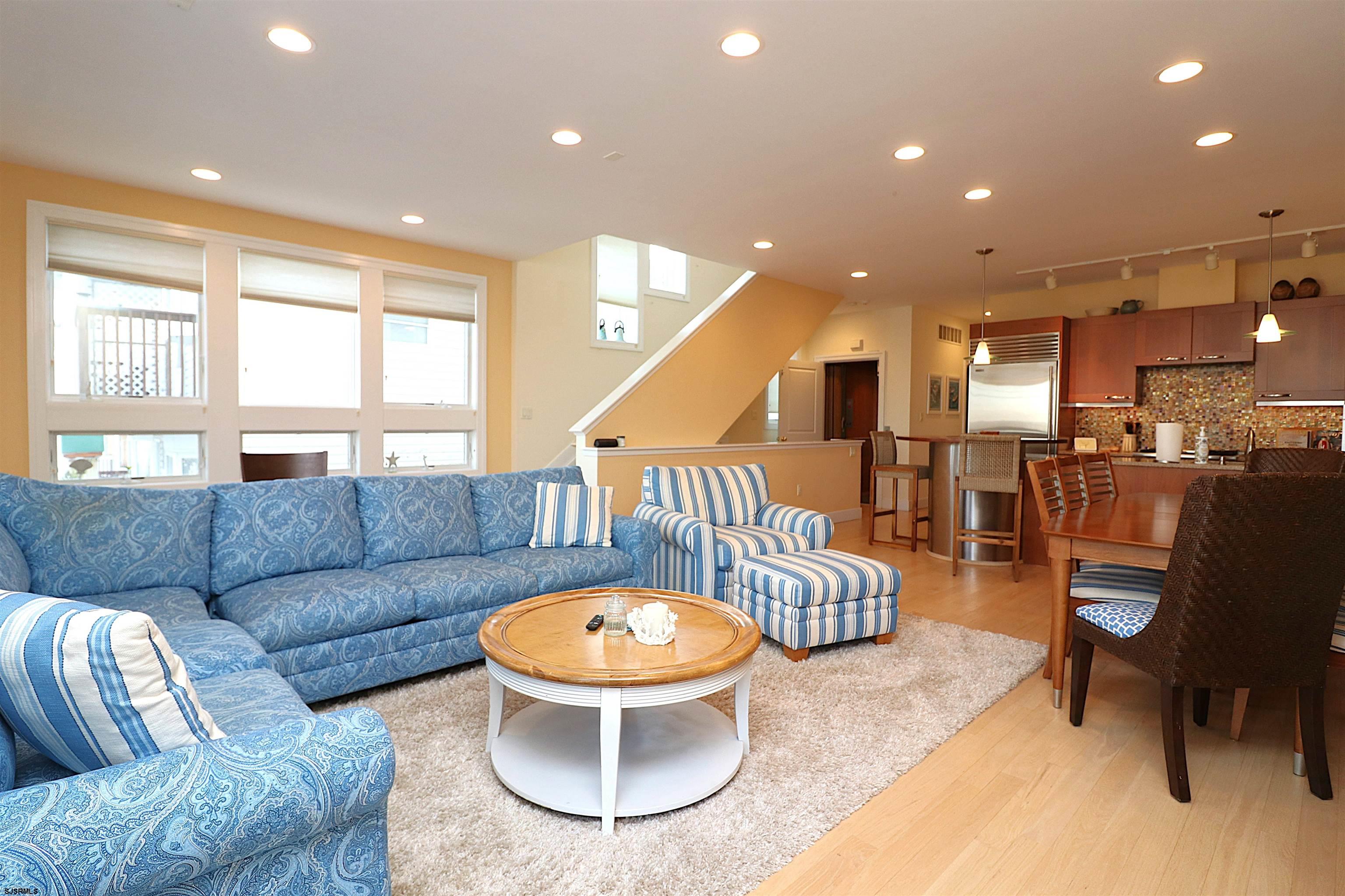 214 North Decatur Avenue, Unit B Margate City, NJ 08402 - Photo 20 of 23 a living room with furniture and a table